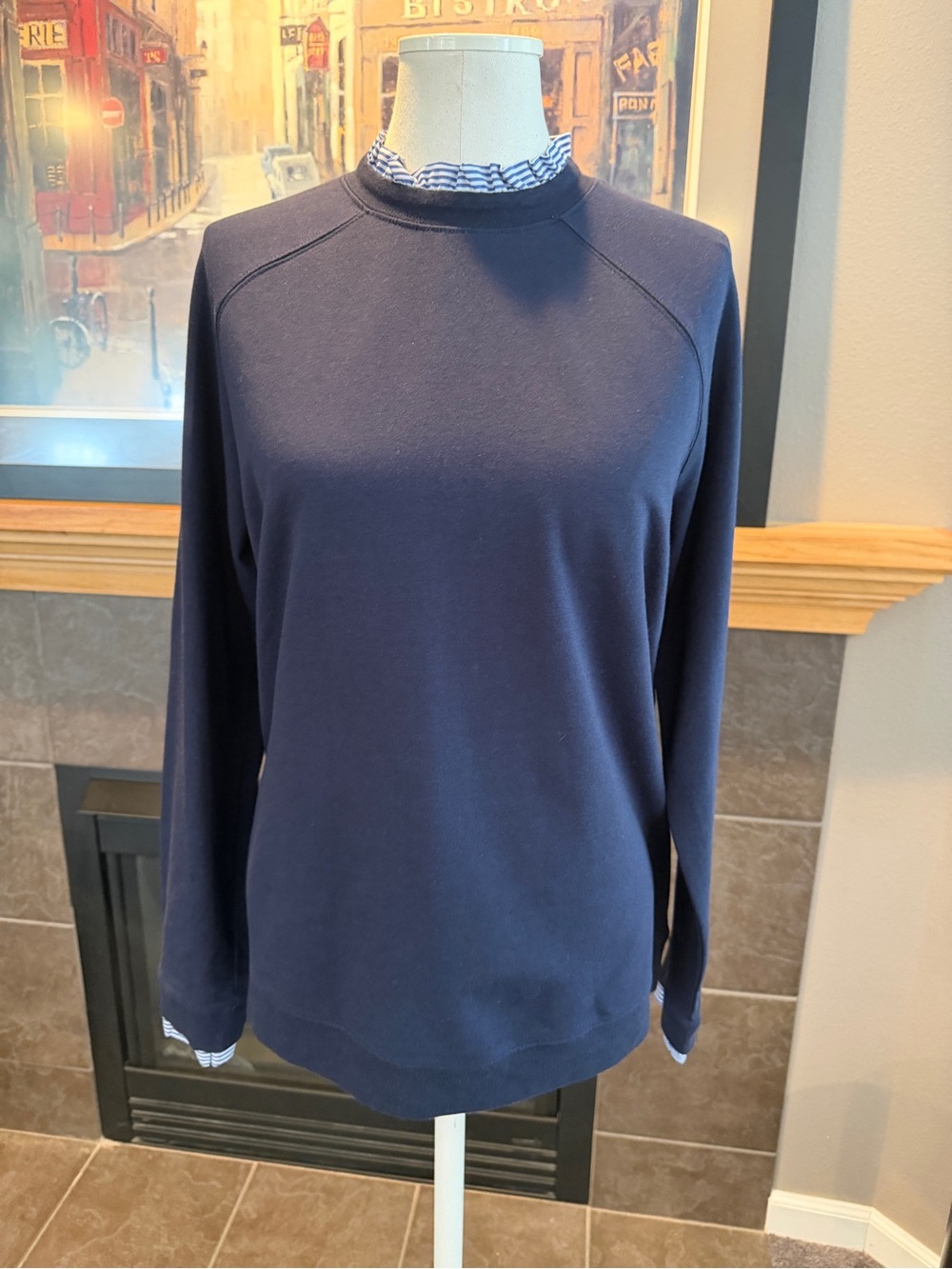 Women’s navy blue sweatshirt with ruffle collar